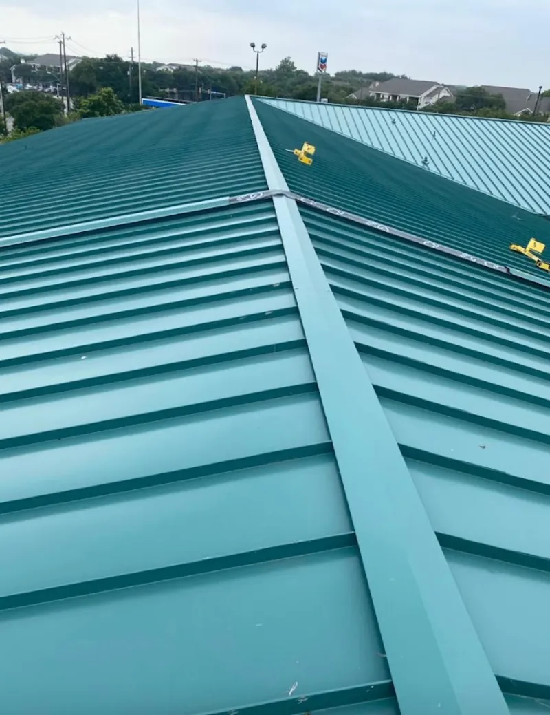 Green commercial metal roof ridge and valley for Metal Roof Repair in Naperville