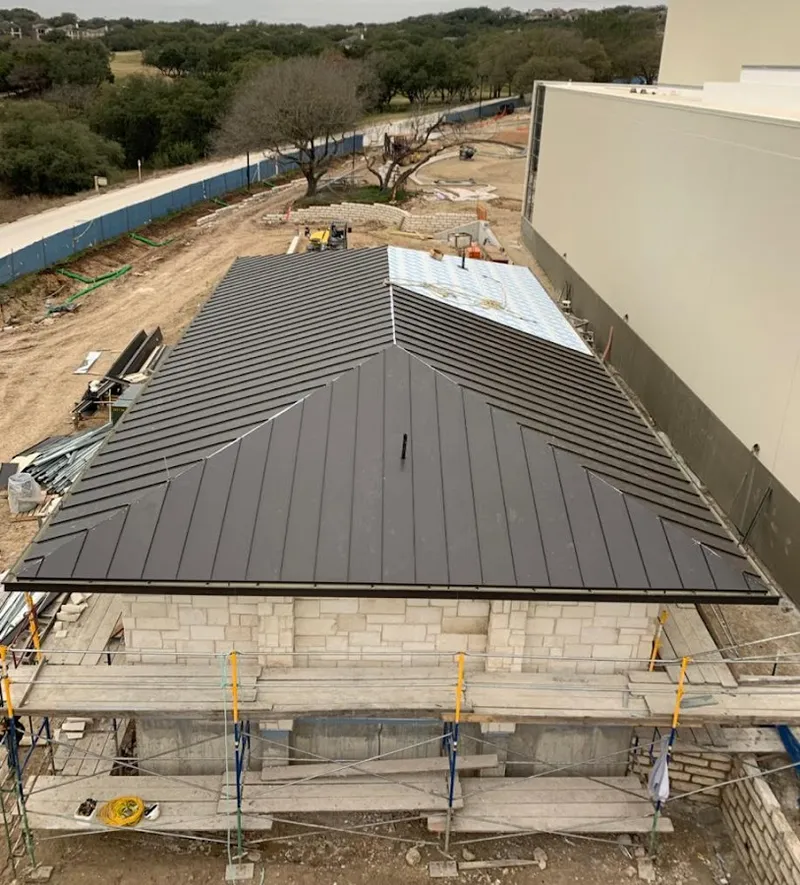 Metal roof new construction with scaffolding in Naperville