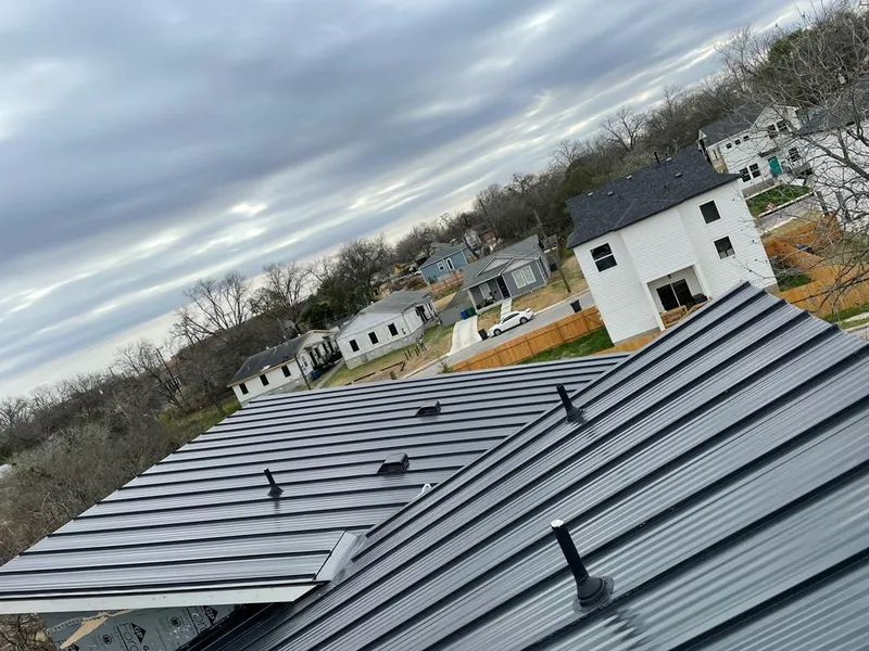 Standing seam metal roof panels with vents for Skylight Repair in Naperville
